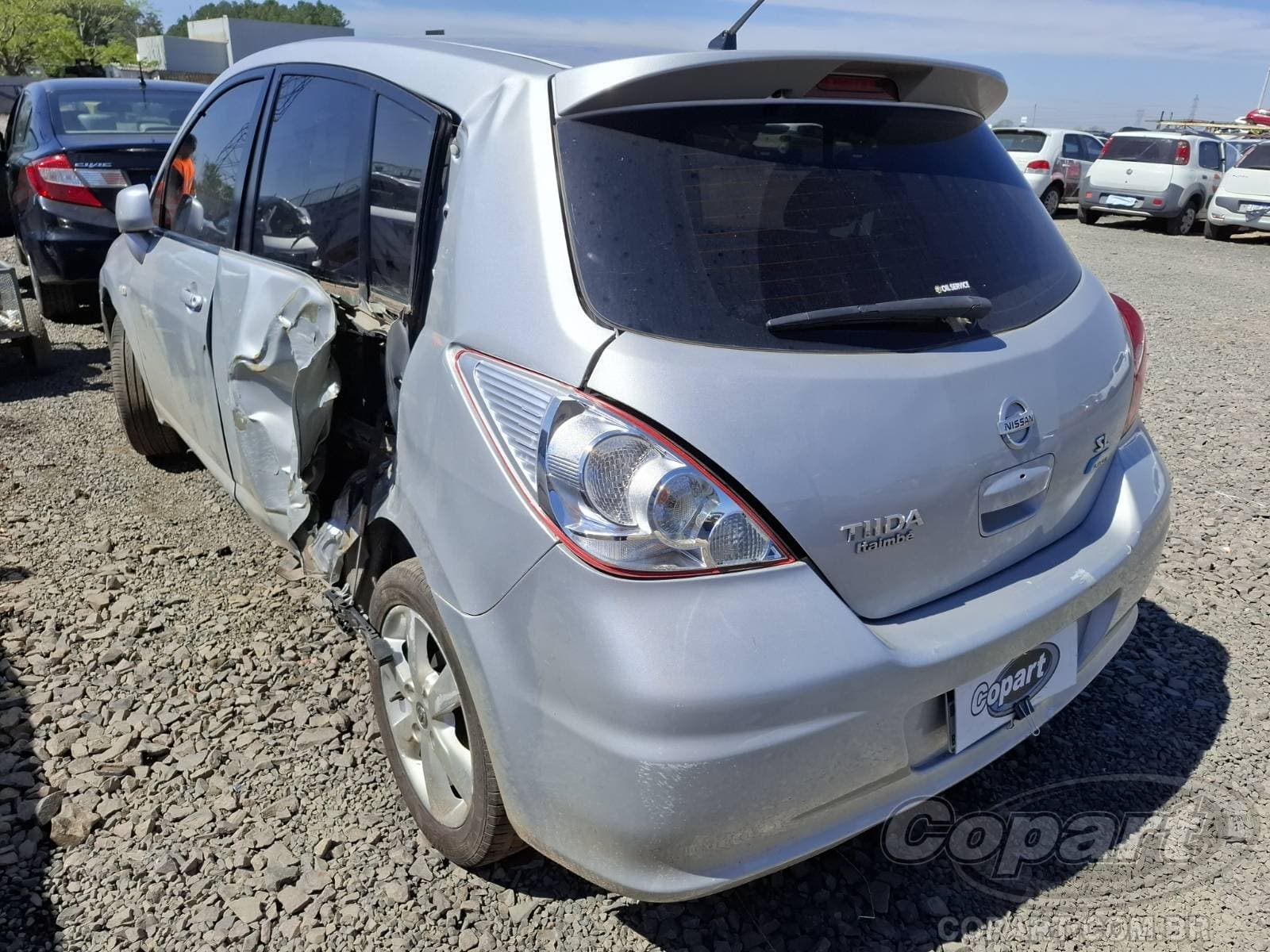 Nissan Tiida 2013 — foto 3