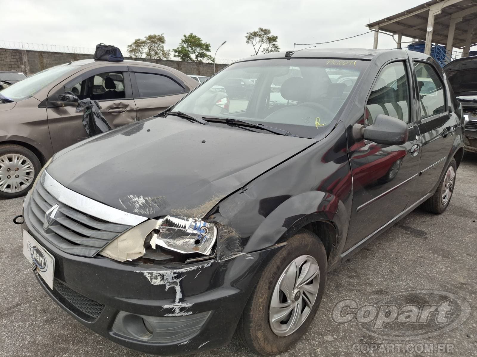 Renault Logan 2011 — foto 2