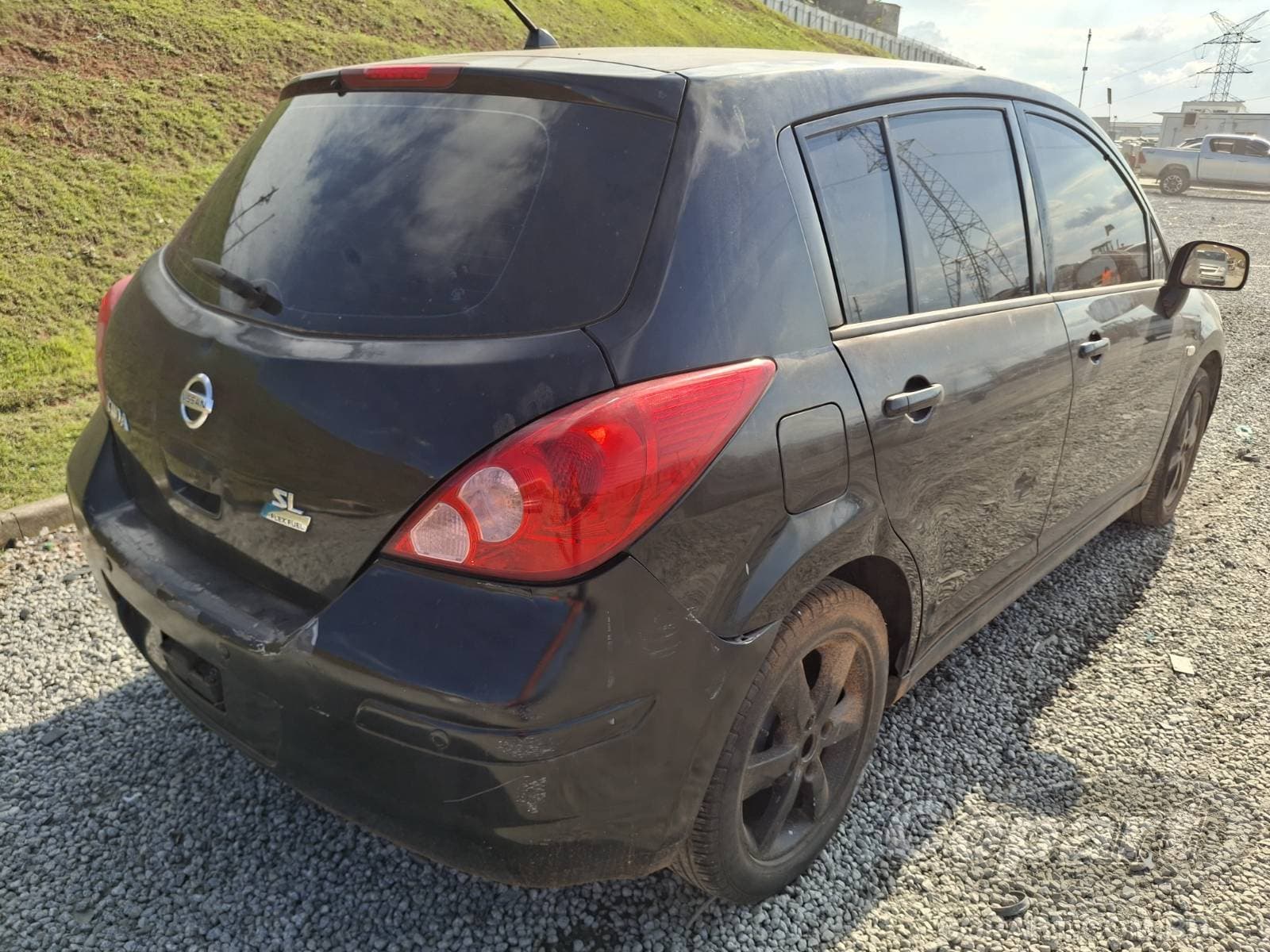 Nissan Tiida 2010 — foto 4