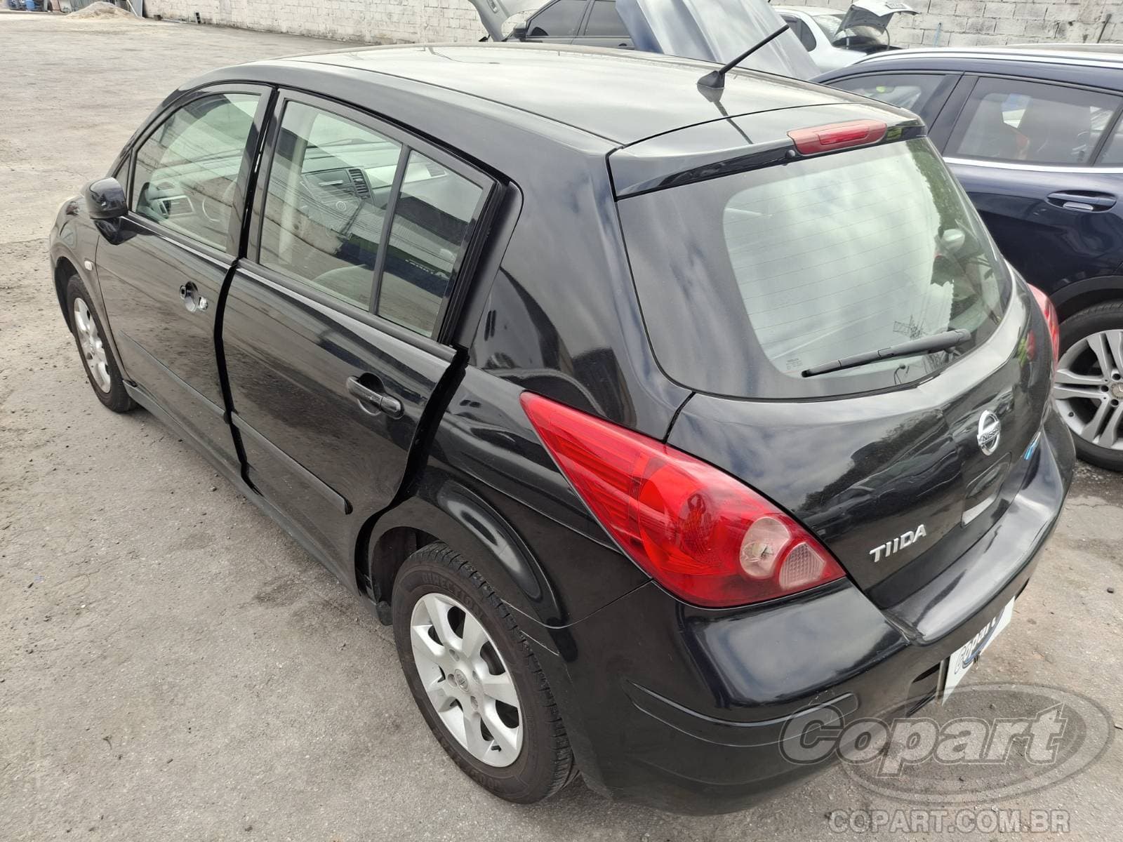 Nissan Tiida 2011 — foto 3
