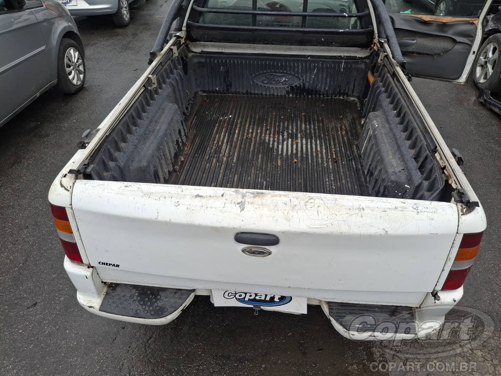 Ford Courier 2004 — foto 6