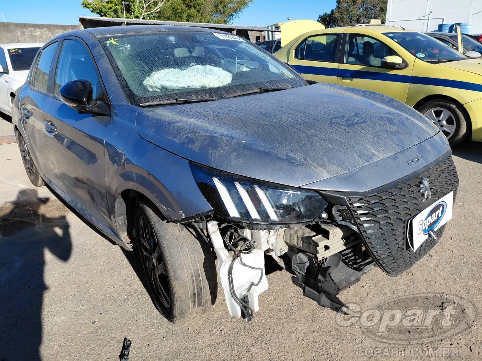 Peugeot 208 2023 — foto 1