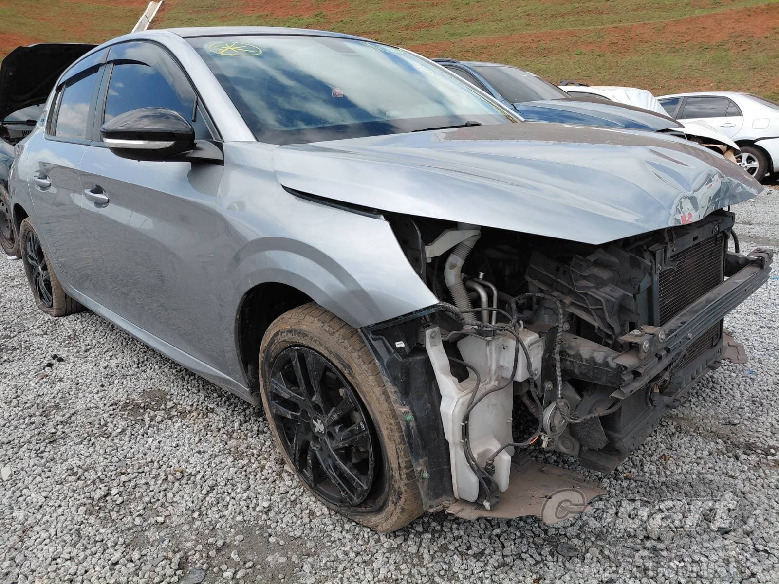 Peugeot 208 2023 — foto 1