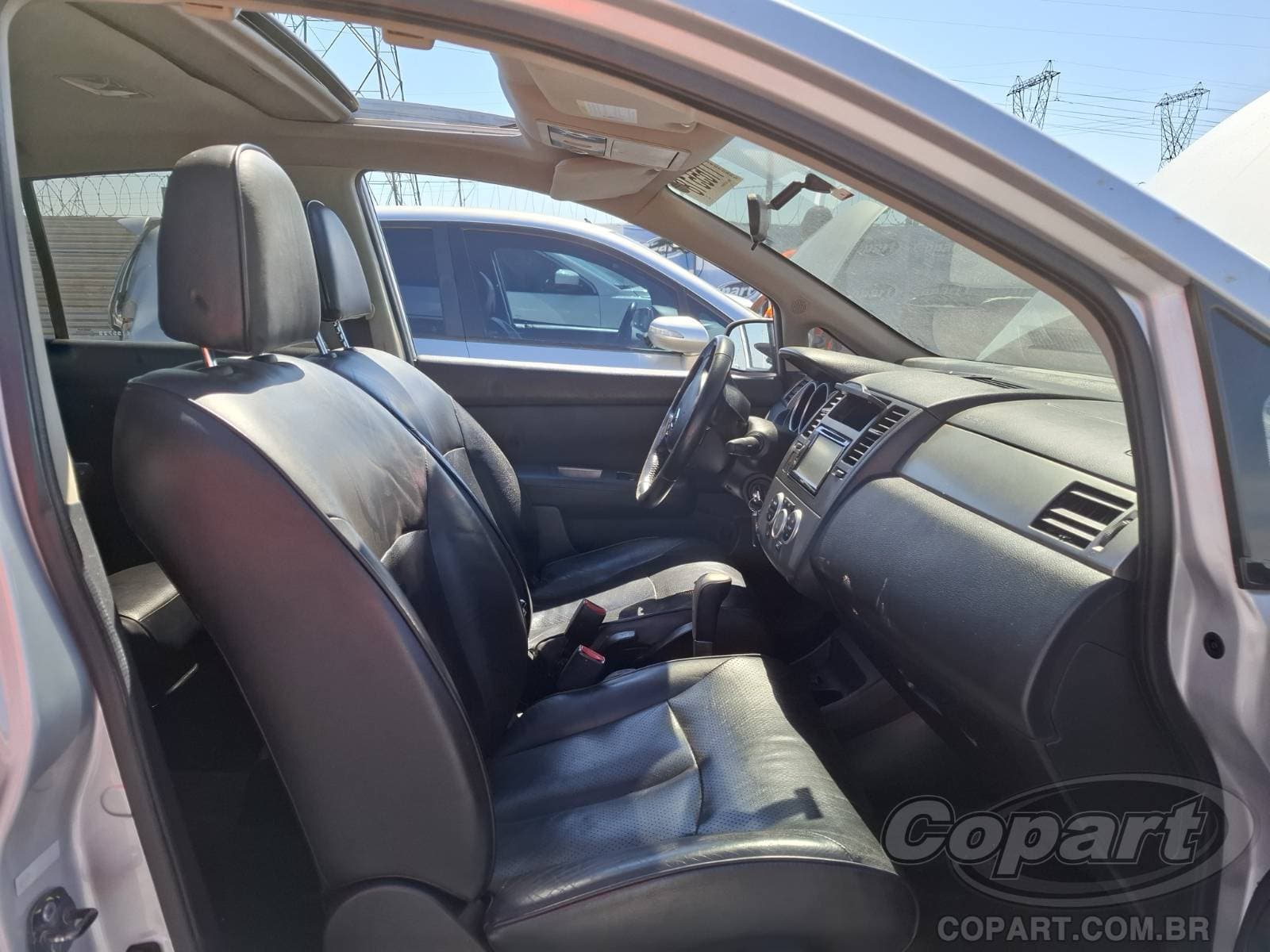 Nissan Tiida 2013 — foto 5