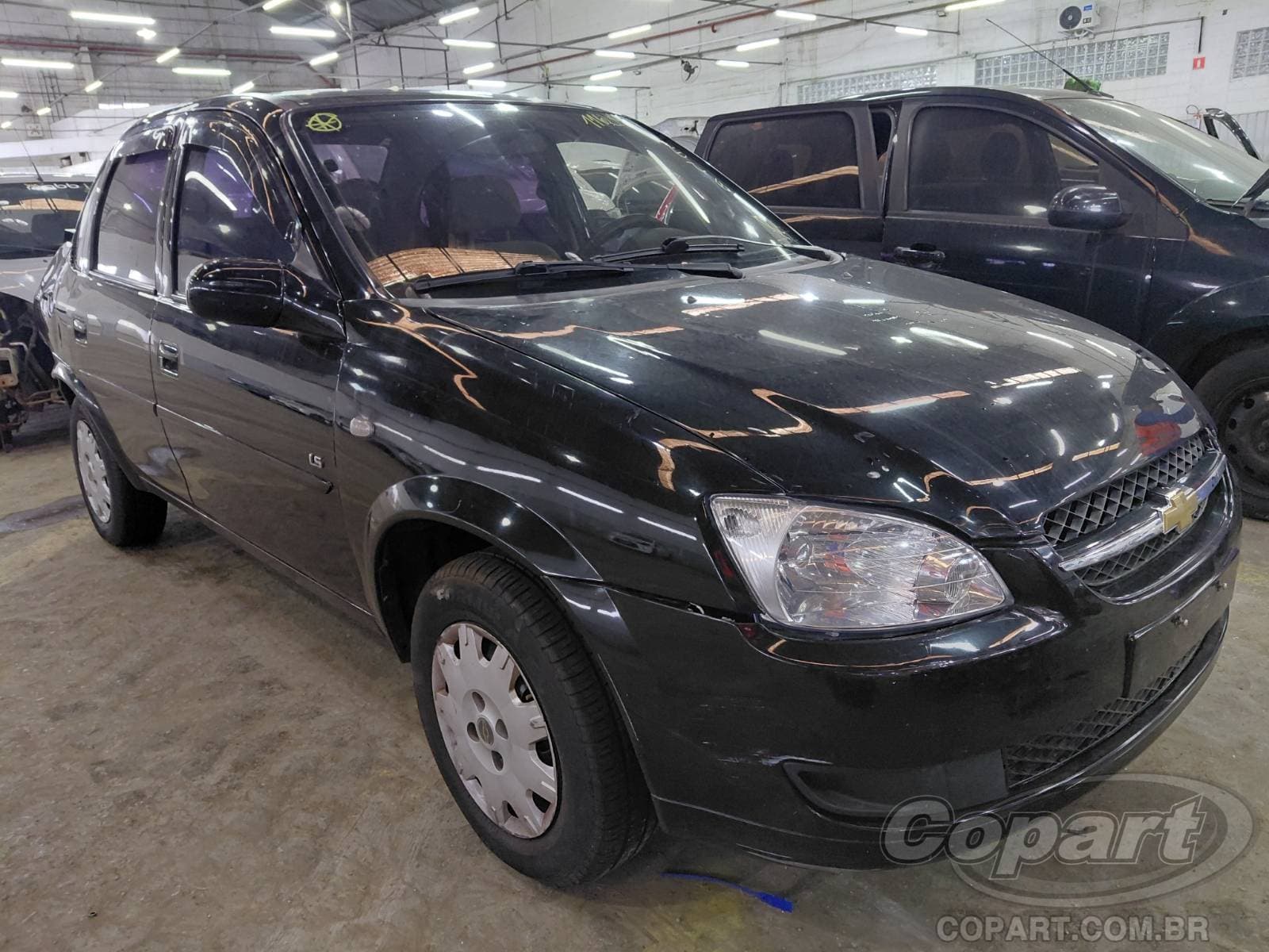 Chevrolet Classic 2011 — foto 1