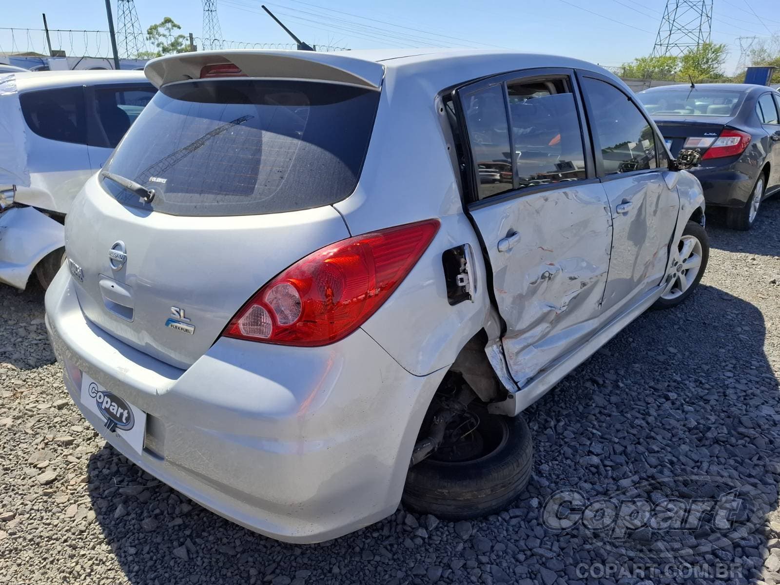 Nissan Tiida 2013 — foto 4