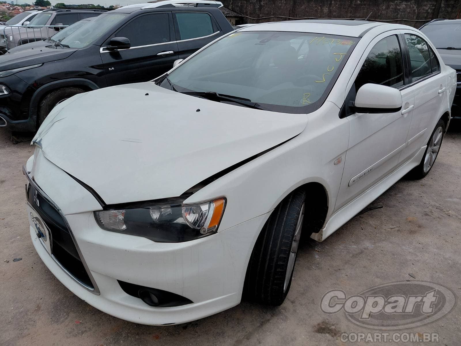 Mitsubishi Lancer 2014 — foto 2