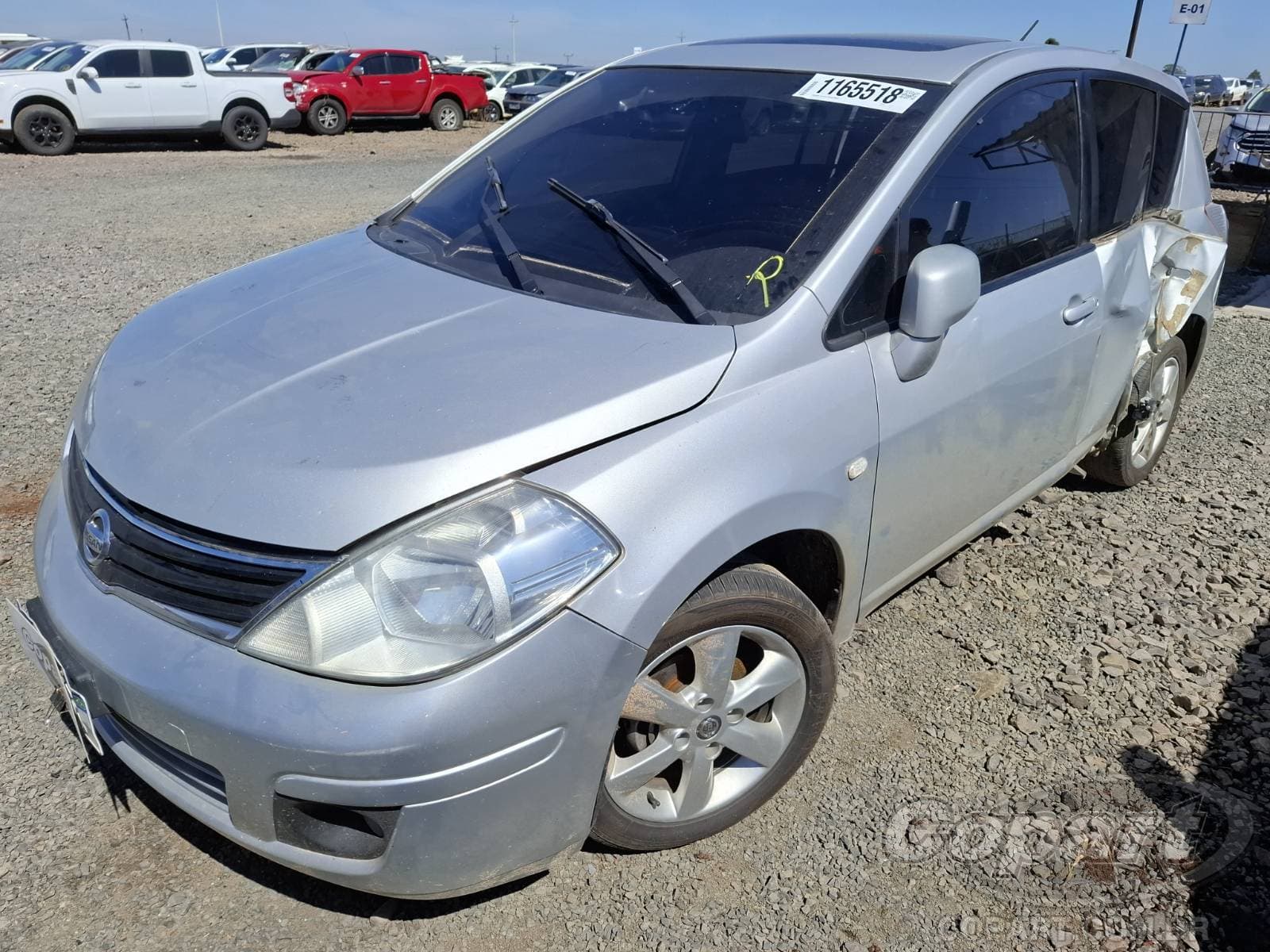 Nissan Tiida 2013 — foto 2