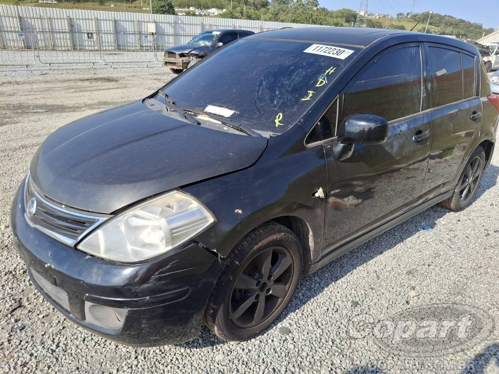 Nissan Tiida 2010 — foto 2