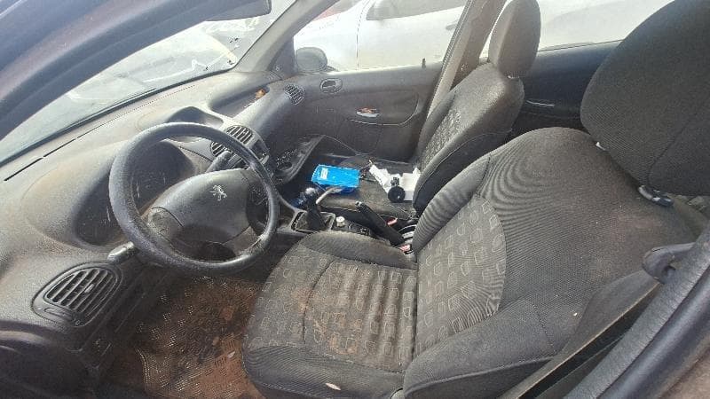 Peugeot 206 2004 — foto 19